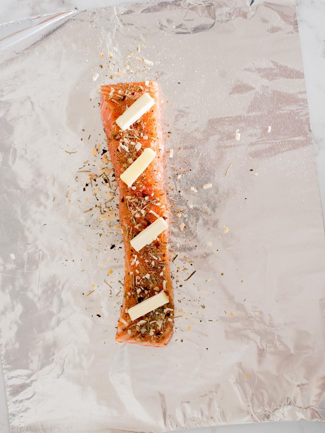 salmon filet with tuscan herb seasoning and butter