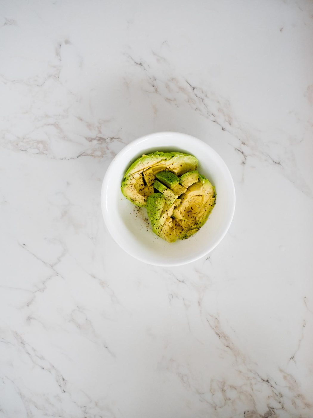 chopped avocado seasoned with salt and pepper