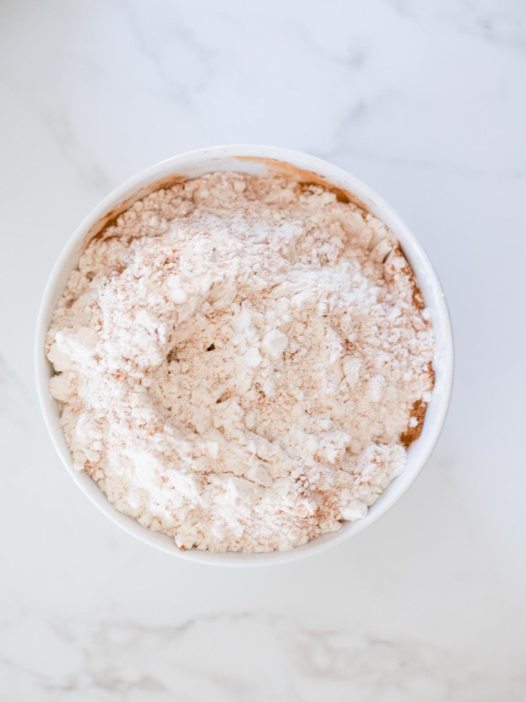 dry flour ingredients mixed together in a bowl