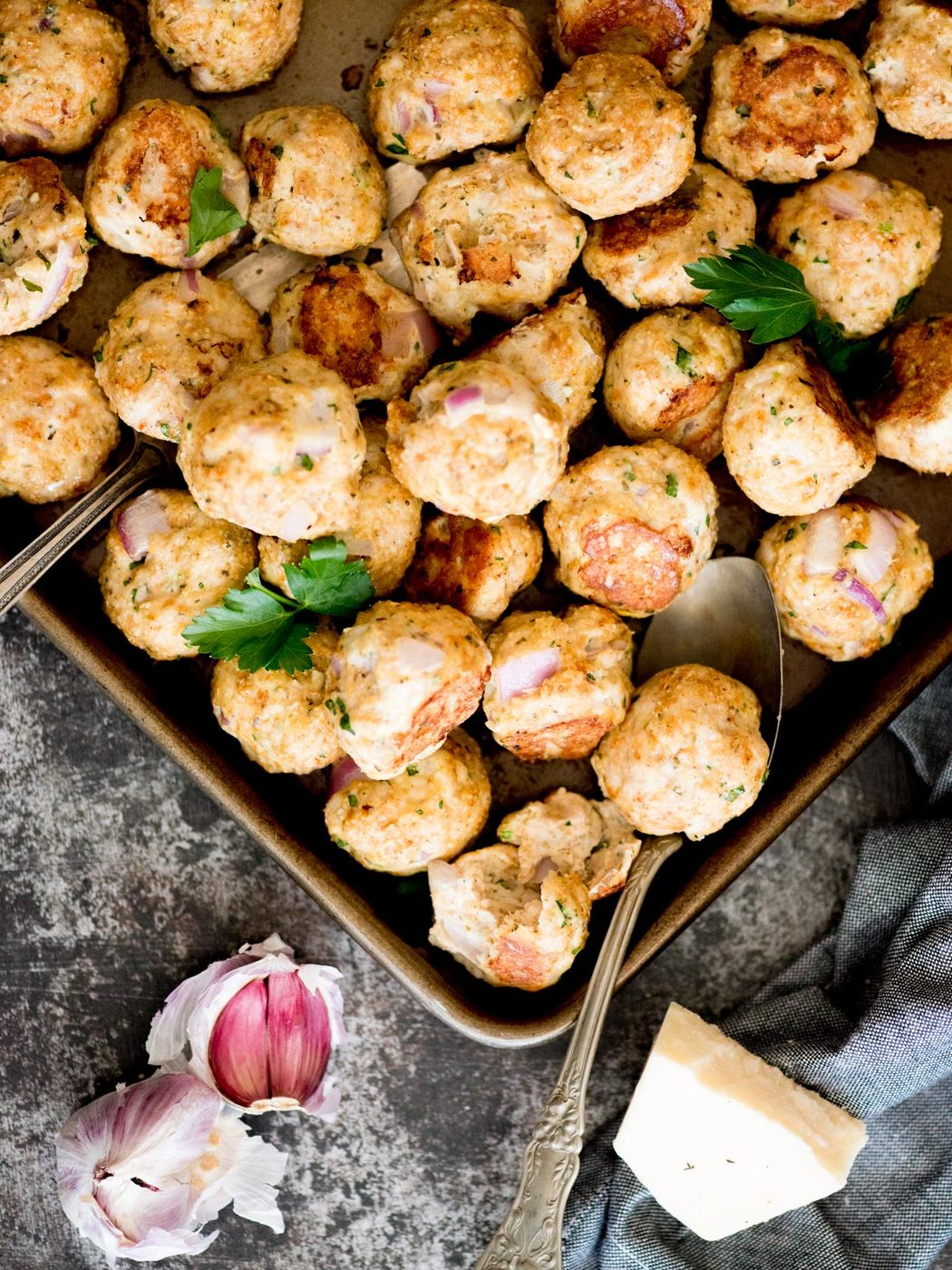 oven baked turkey meatballs on a baking sheet