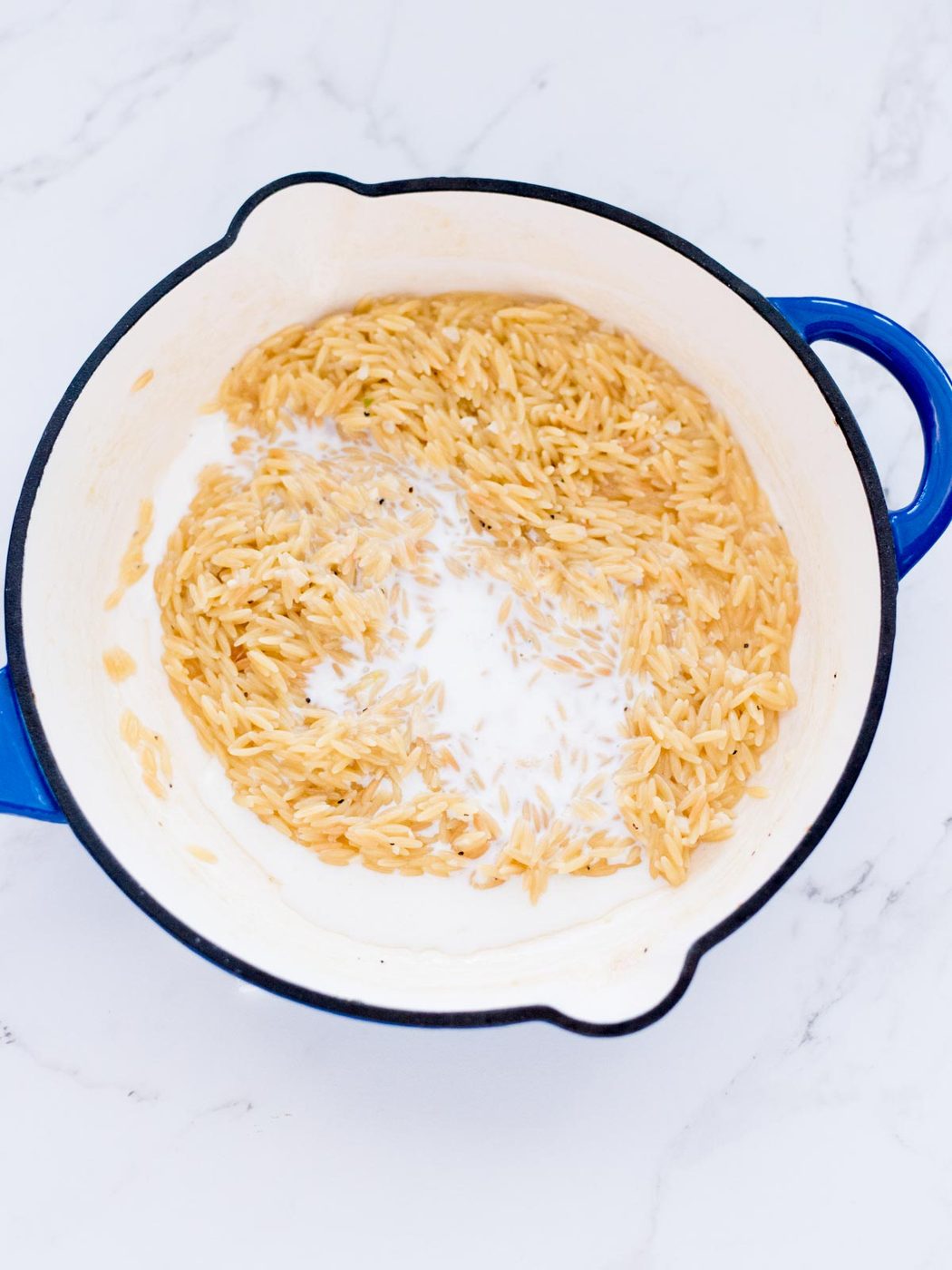 milk added to cooked orzo