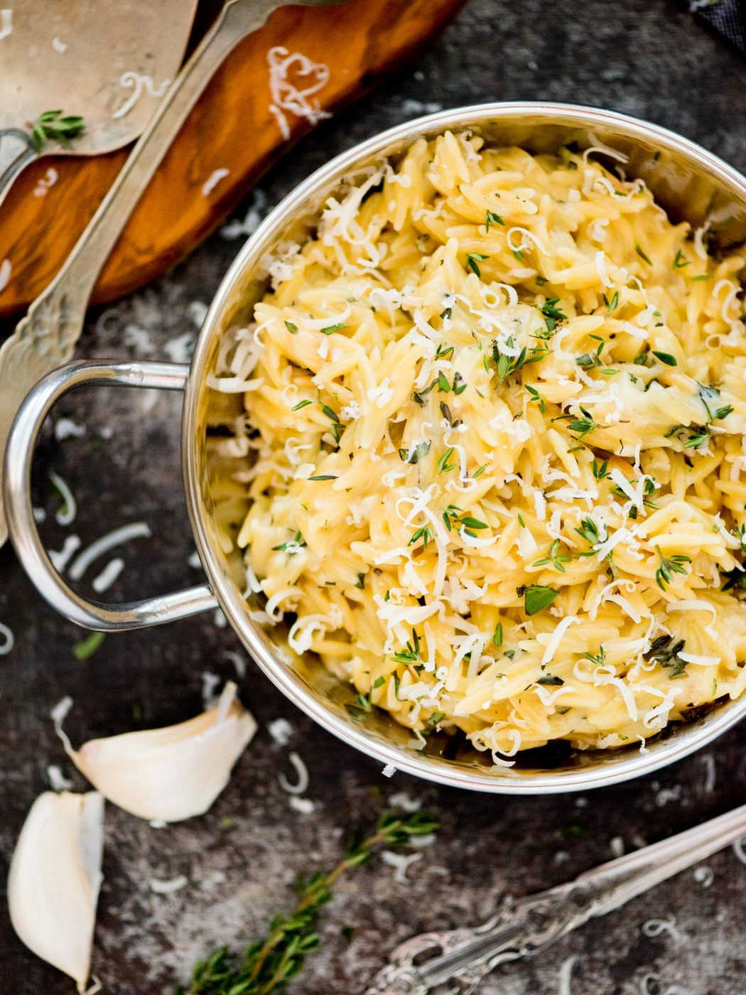 parmesan orzo topped with fresh herbs and parmesan