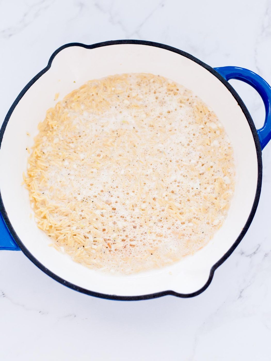 toasted orzo in butter with garlic, salt, and pepper
