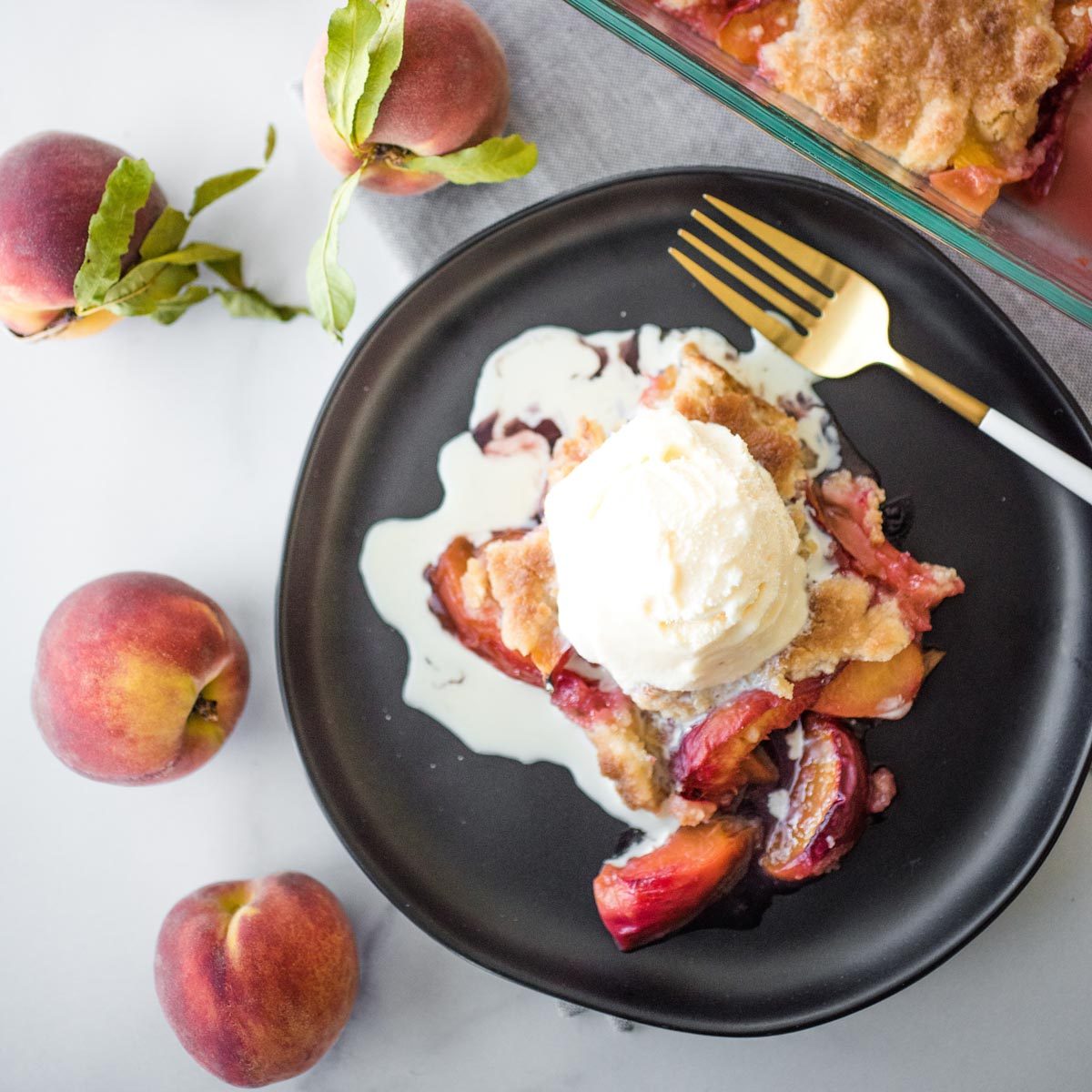 Southern Peach Cobbler and Fresh Peaches