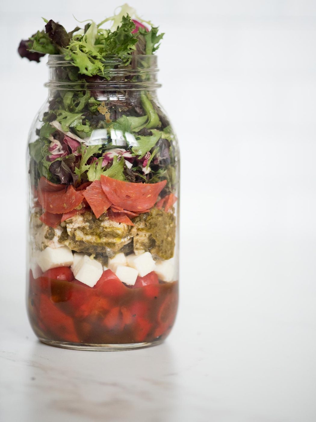 pesto chicken mason jar salad in a jar