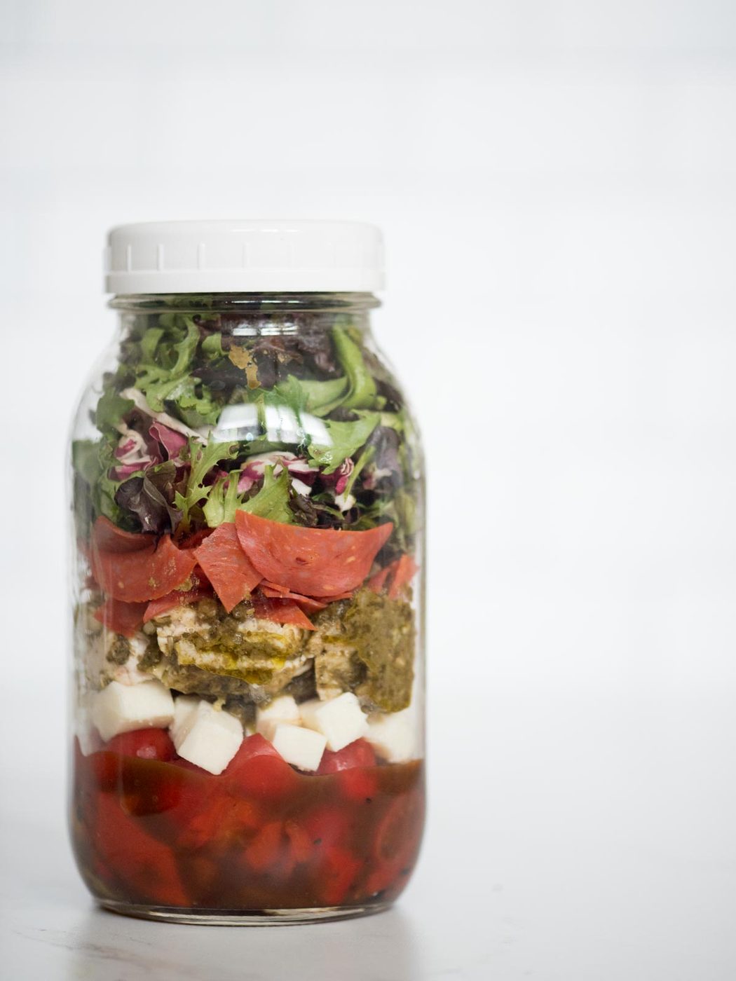 pesto chicken mason jar salad in a jar