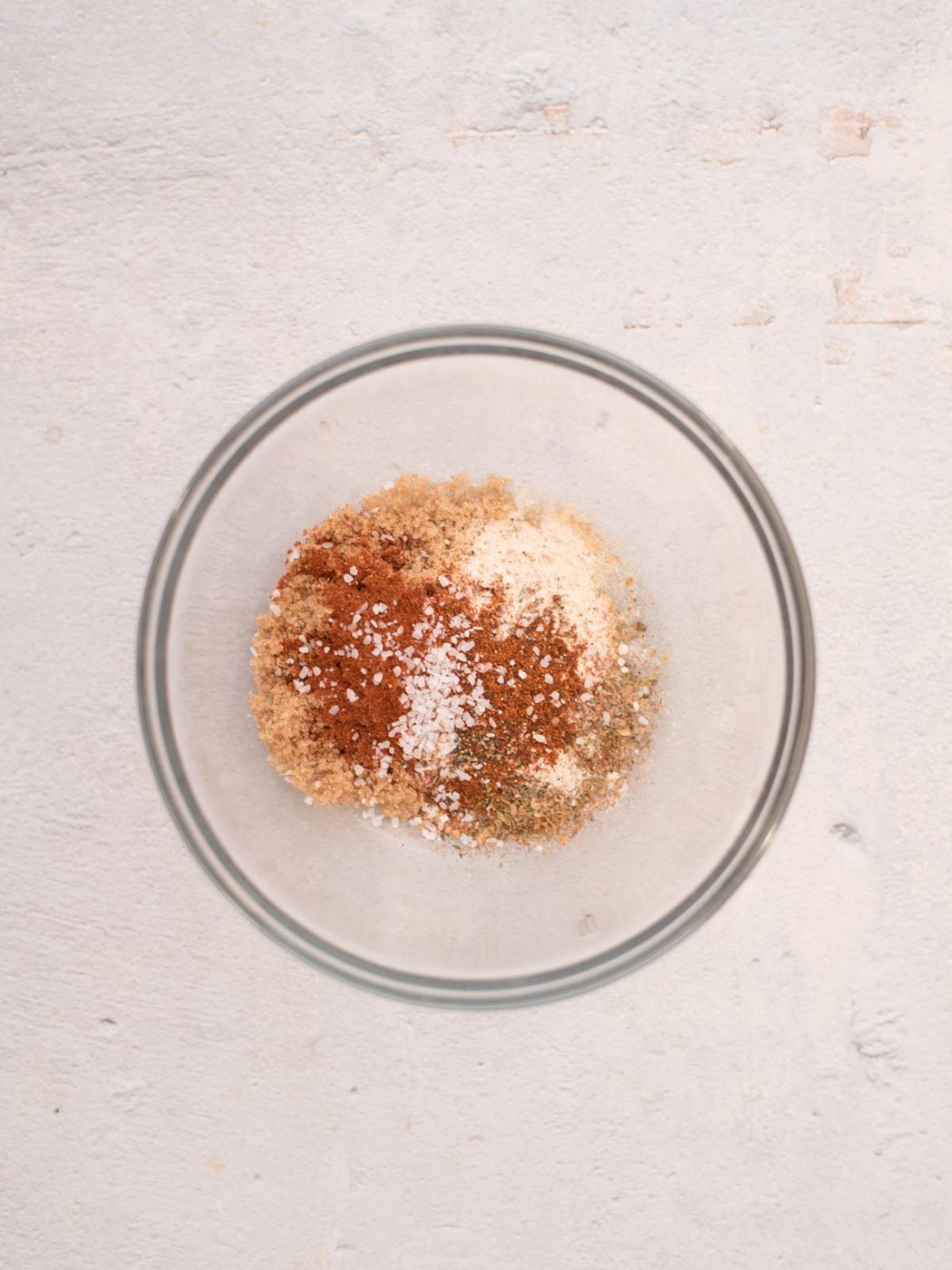 all seasonings combined in a small glass mixing bowl