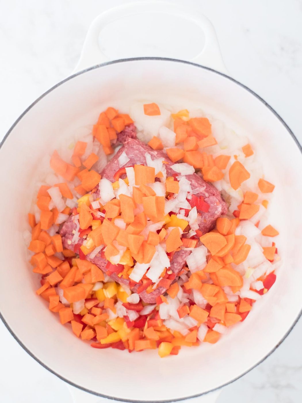 carrots added to the enamel cast iron dutch oven