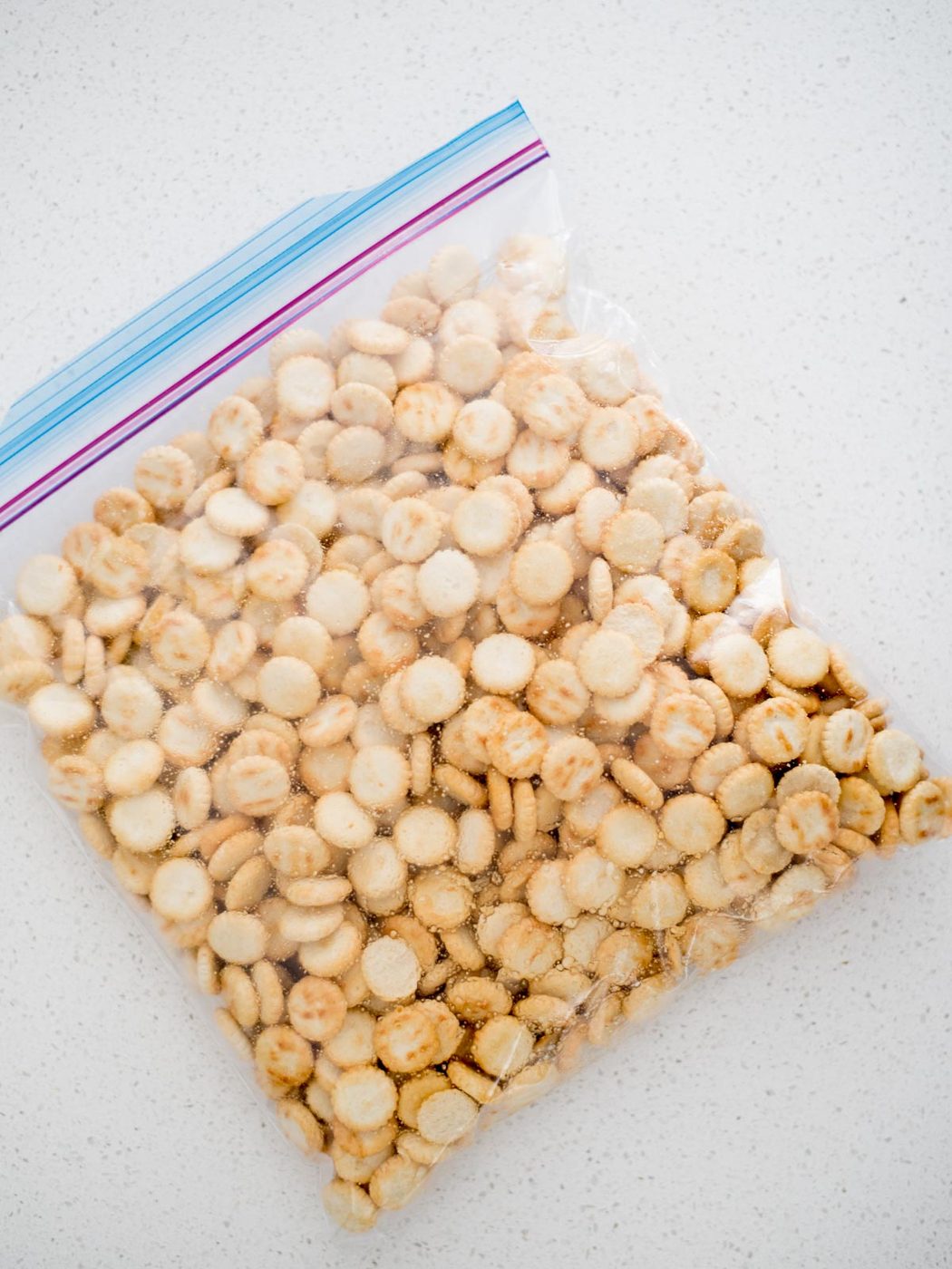Sealed ziploc bag of seasoned oyster crackers.