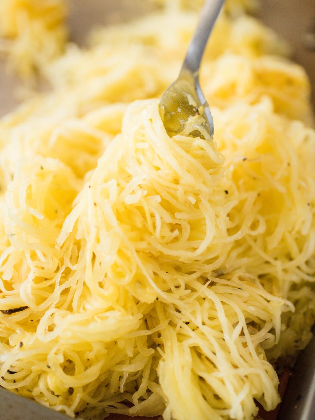 spaghetti squash being twirled on a fork