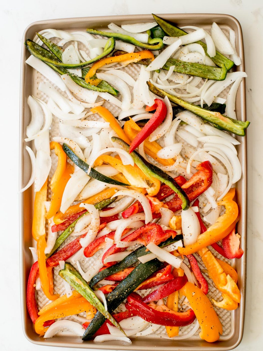 seasoned vegetables on a sheet pan
