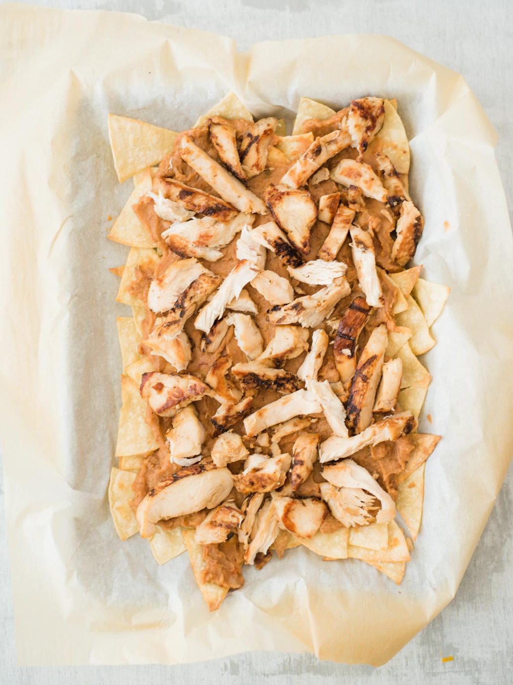 chips beans and chicken layered
