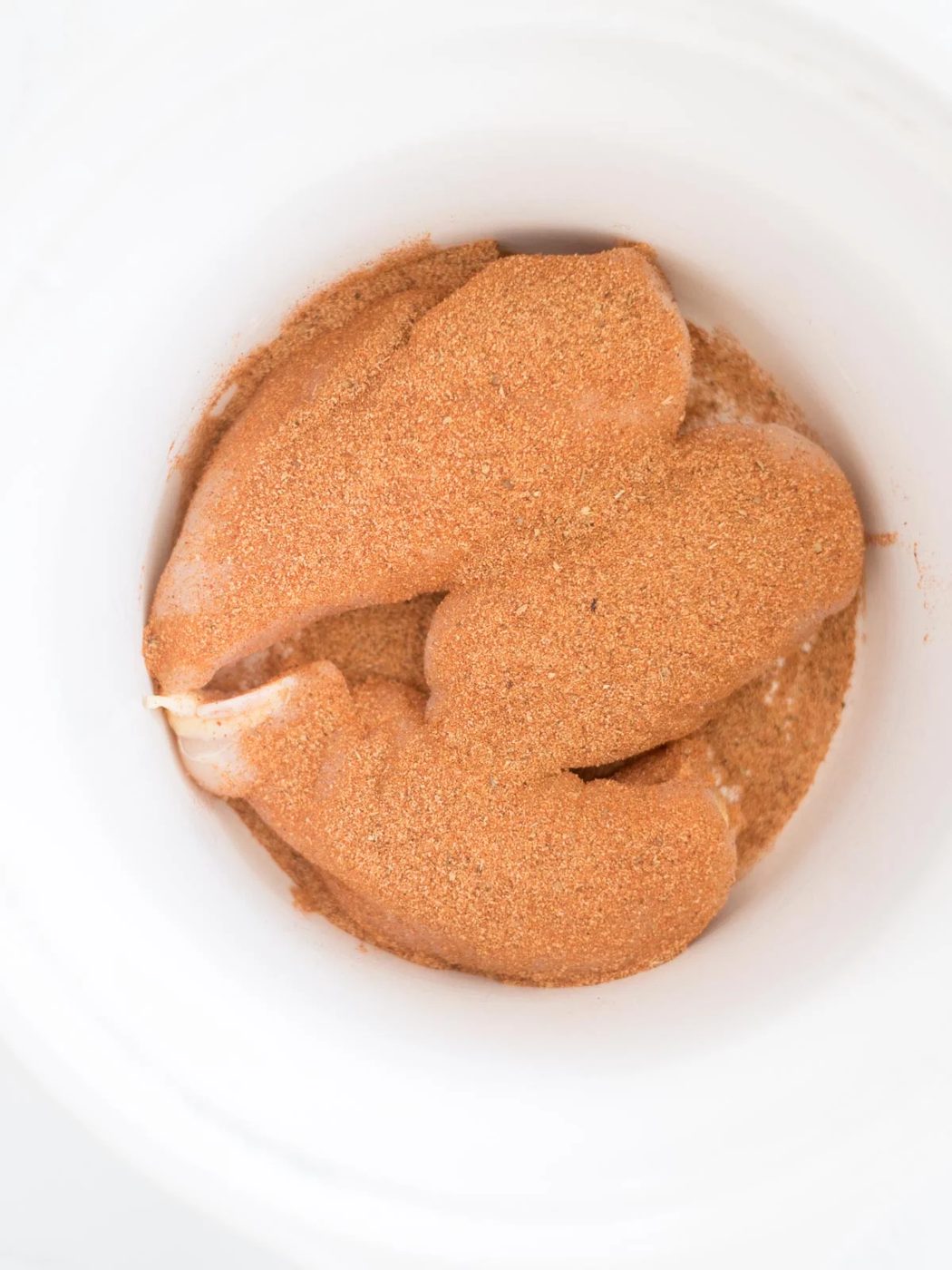 taco seasoning on chicken in the crockpot