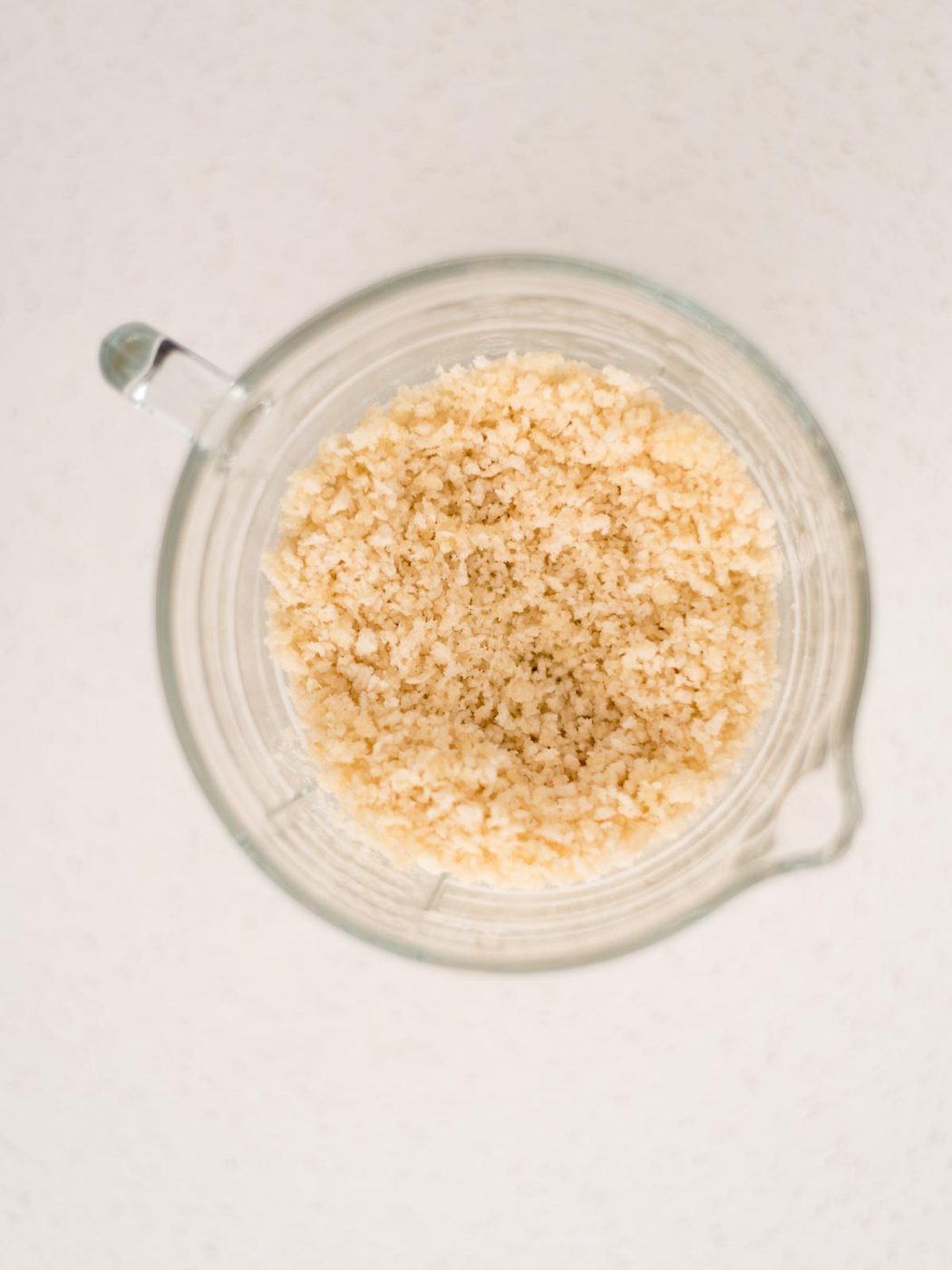 butter mixed with panko in a measuring cup