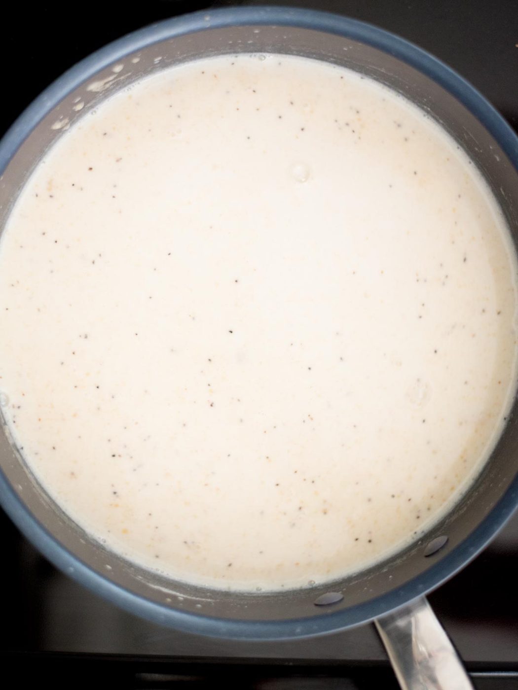 half and half added to the skillet with the roux