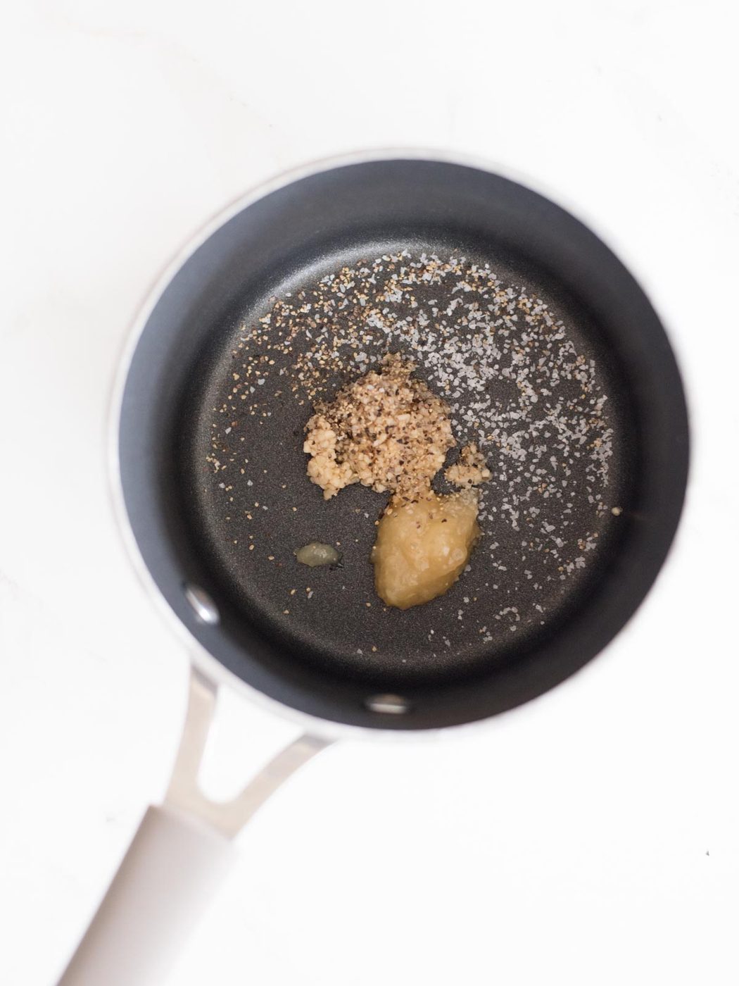 salt, pepper, garlic, and ginger in a sauce pan