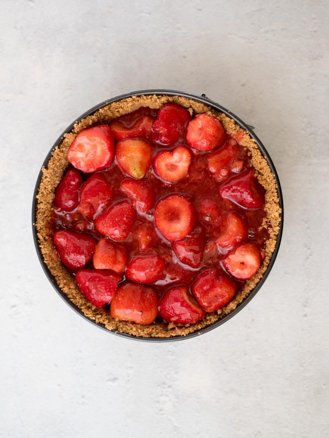 strawberry pie in a graham cracker crust in a springform pan