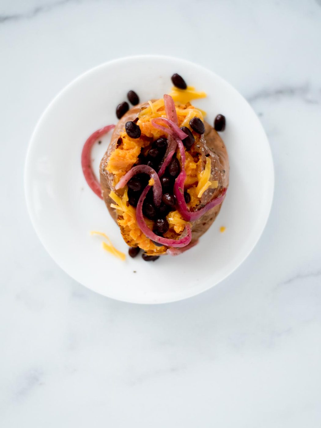 red onion on sweet potato