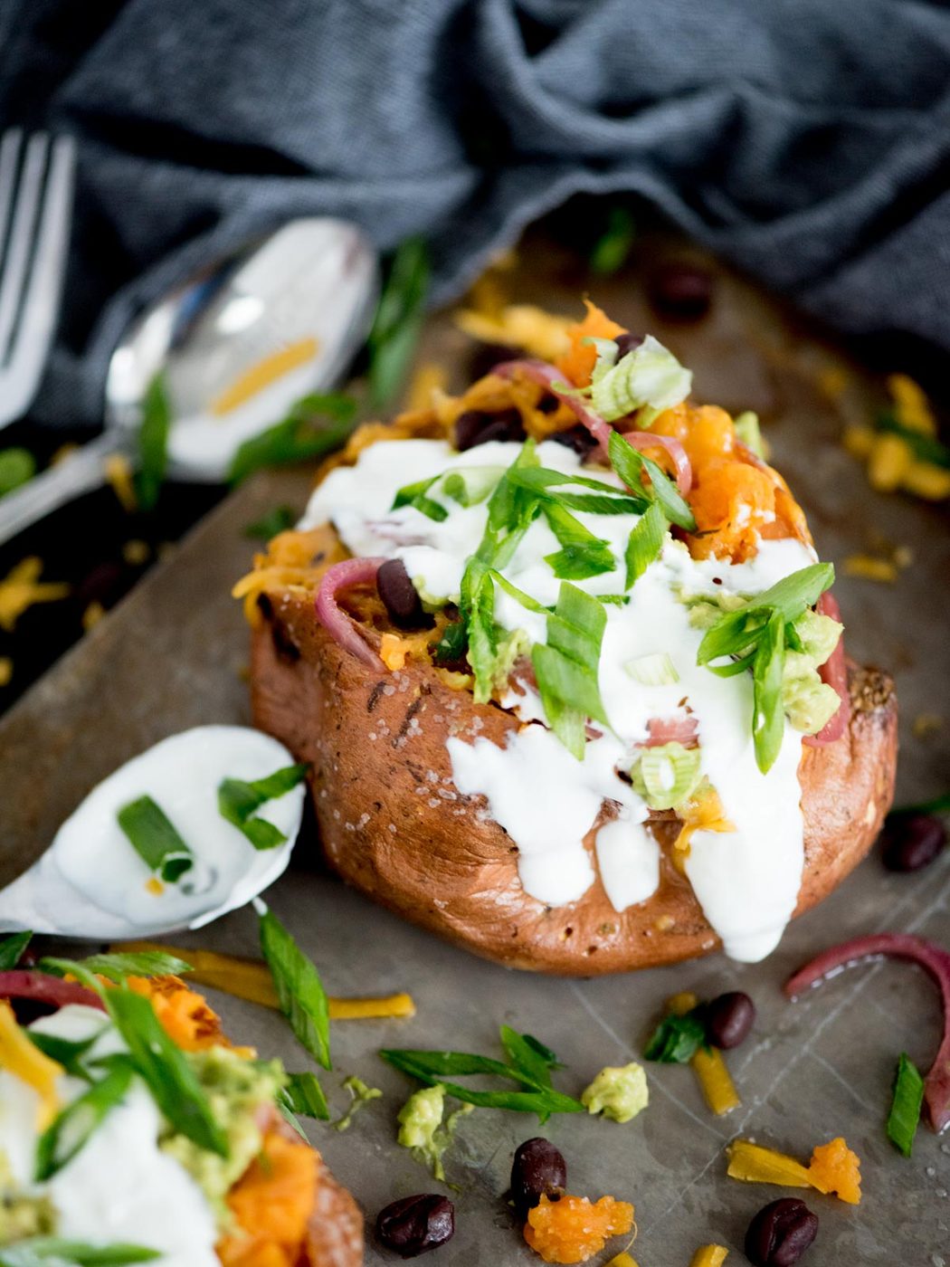 Vegetarian Stuffed Sweet Potatoes on a baking sheet