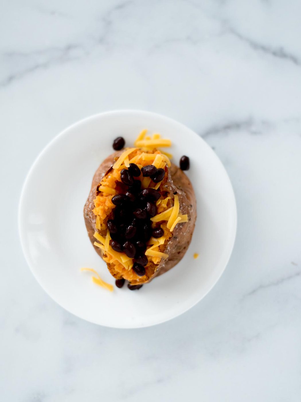 black beans on sweet potato