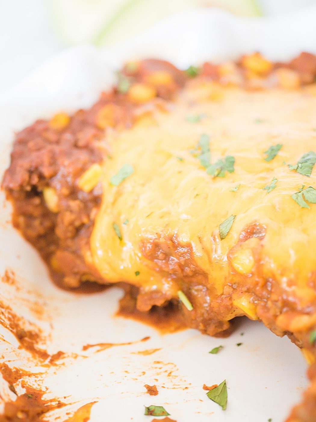 melting cheese on taco pie in a pie dish