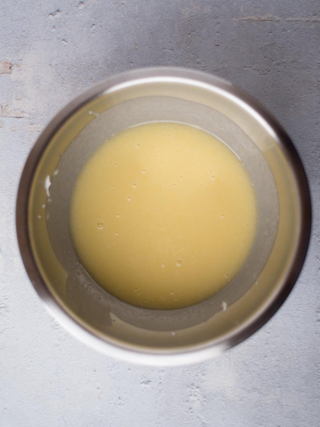 Wet ingredients of texas sheet cake in a mixing bowl