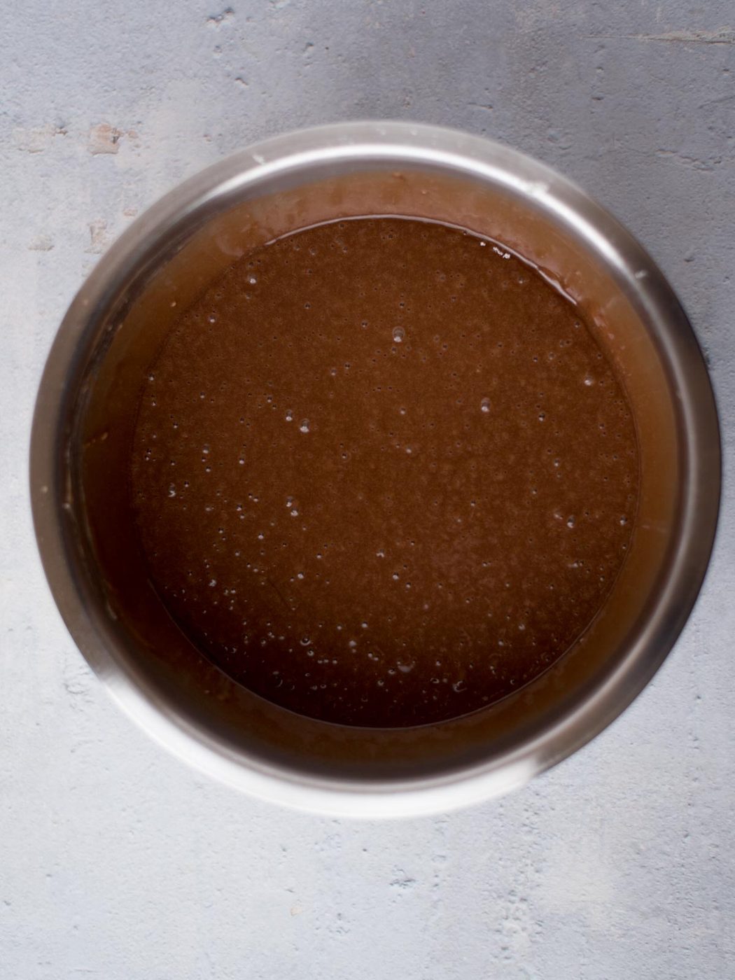 Texas Sheet Cake ingredients mixed together in a mixing bowl