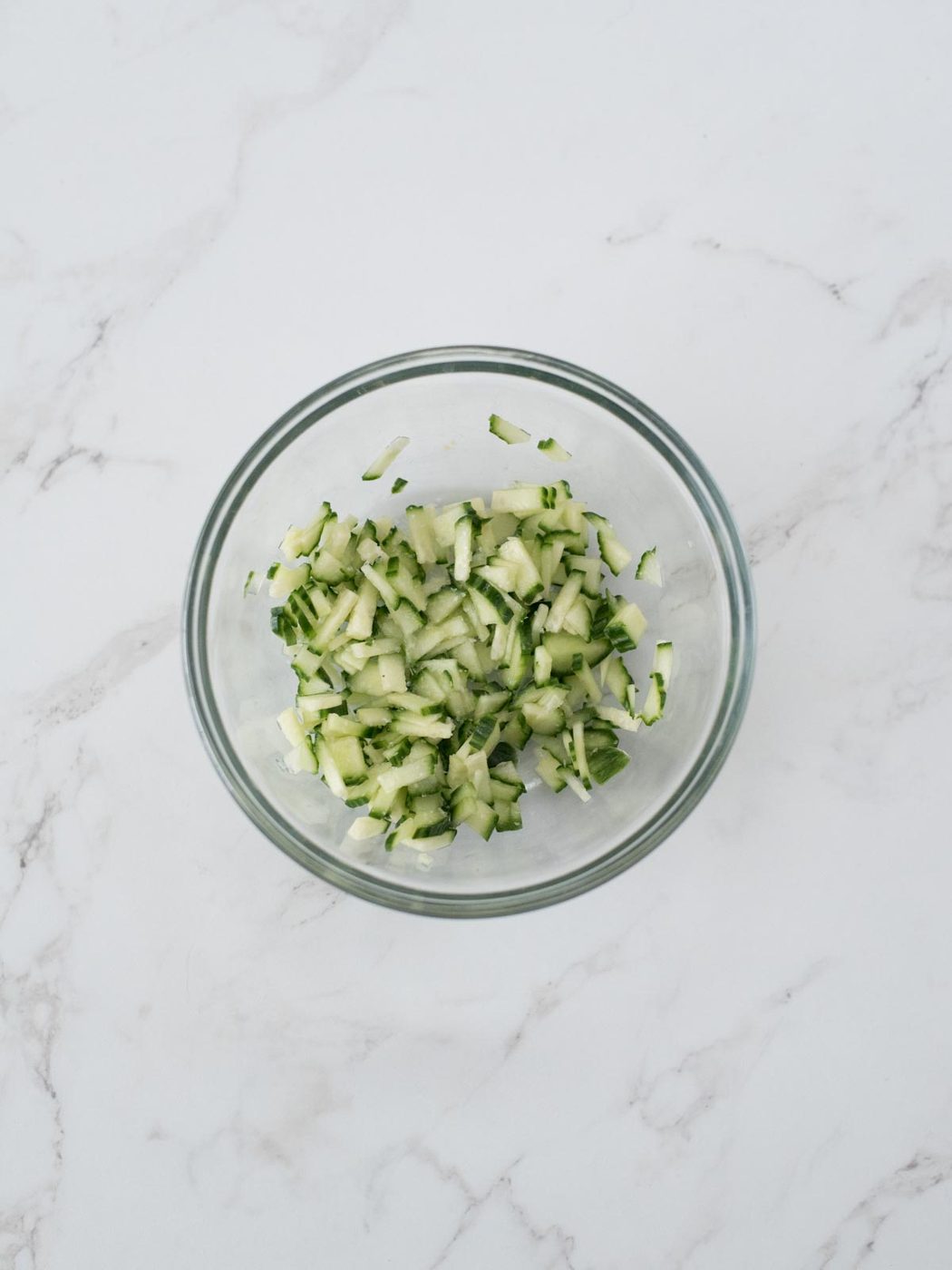 cucumbers with kosher salt in a bowl