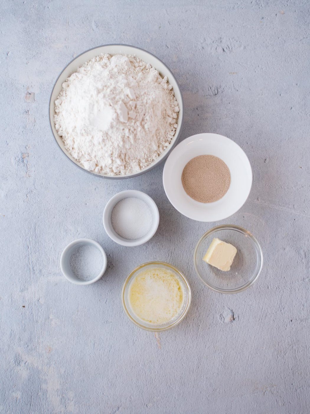 ingredients for from-scratch yeast rolls in bowls