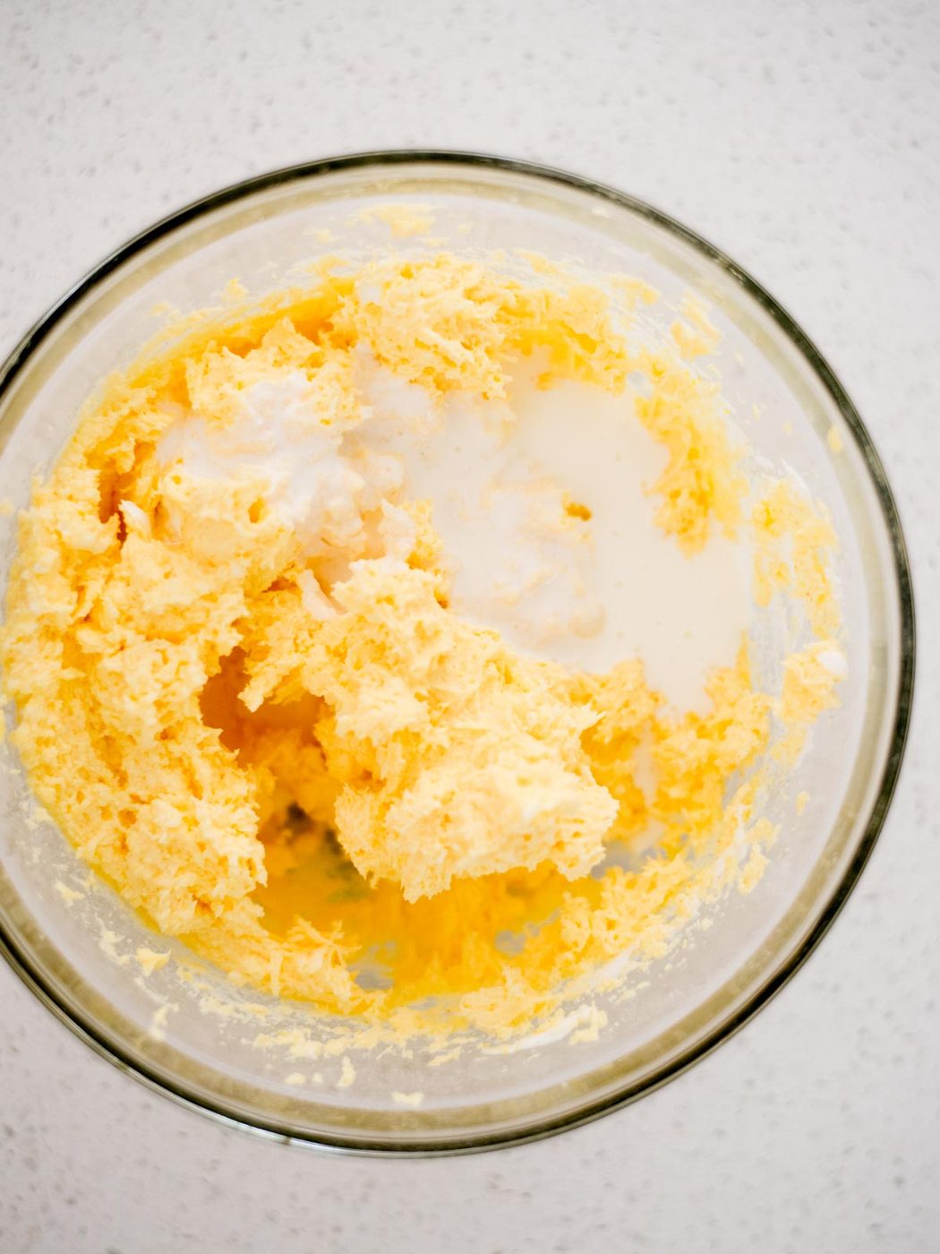whipping cream added to the mixing bowl