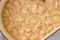 Hearty Chicken and Dumplings with Golden Biscuits