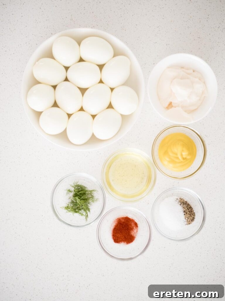 Dill-icious Egg Salad: Perfect for Quick Wraps and Elegant Tea Sandwiches 3 Fresh ingredients laid out on a kitchen counter, ready to make an easy and delicious egg salad recipe