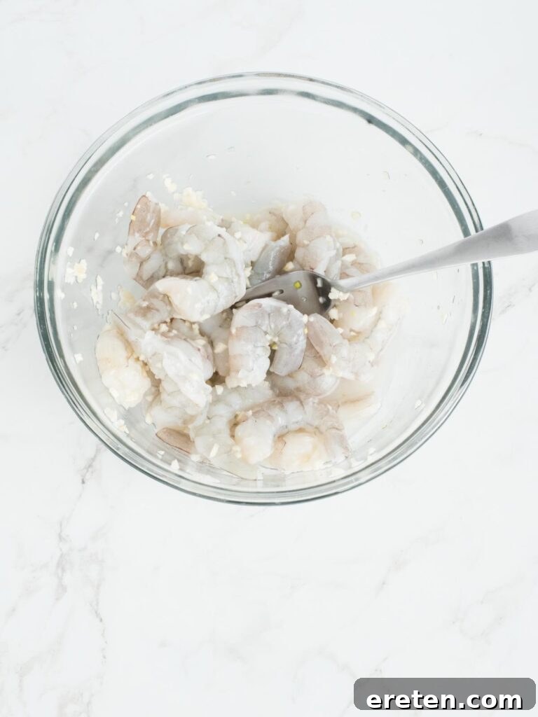 No-Fuss Baked Shrimp Scampi 4 shrimp garlic and wine mixed together in a bowl