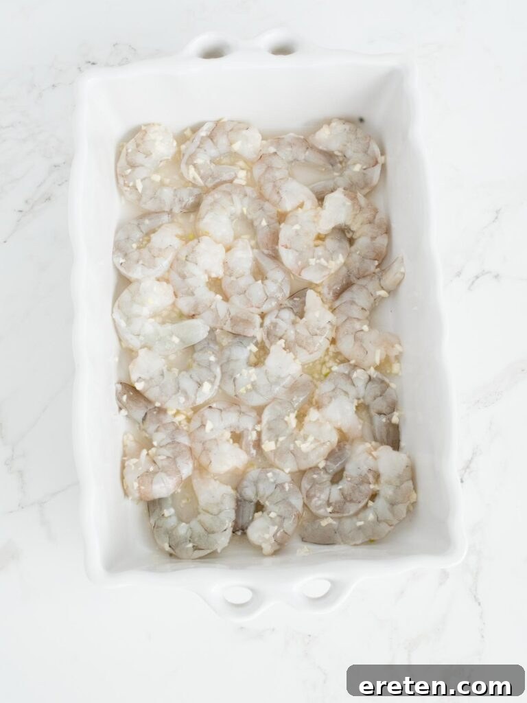 No-Fuss Baked Shrimp Scampi 5 shrimp, garlic, and wine in a baking dish