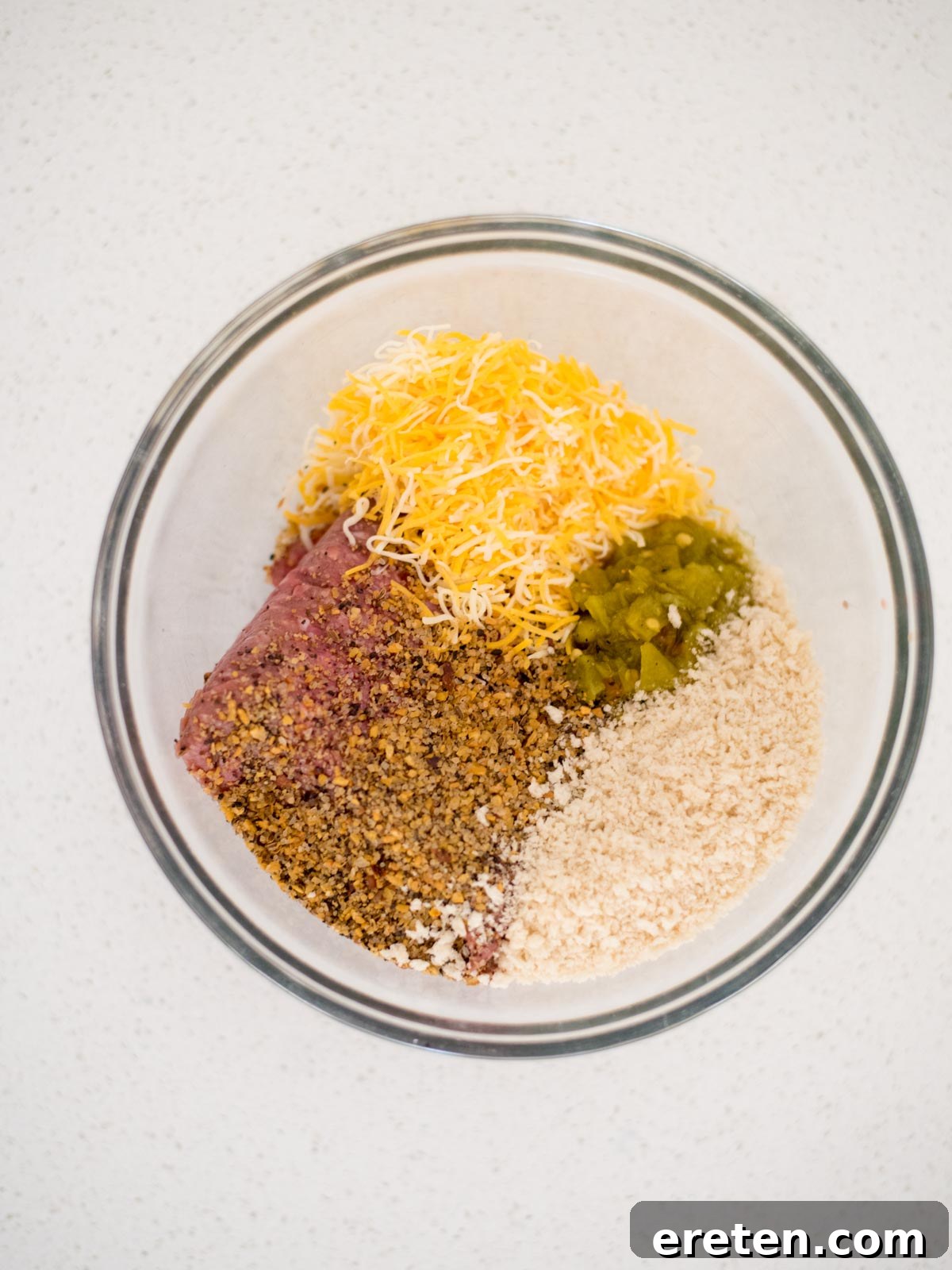 ingredients for pit boss smoked hamburgers in a mixing bowl