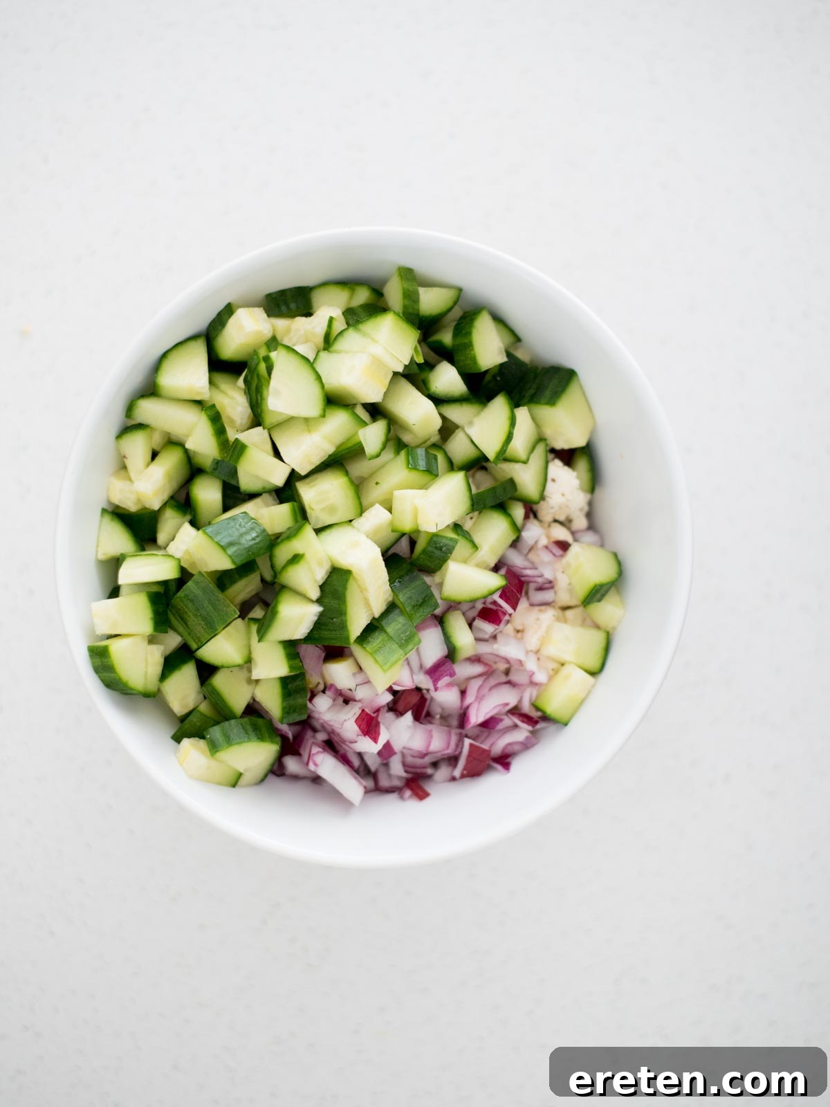 chopped vegetables in a mixing bowl