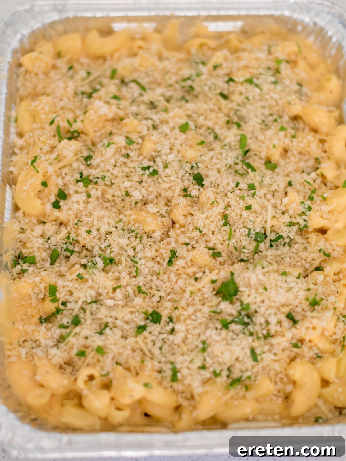 Next-Level Smoked Macaroni 17 breadcrumb mixture added to the top of the macaroni and cheese sauce