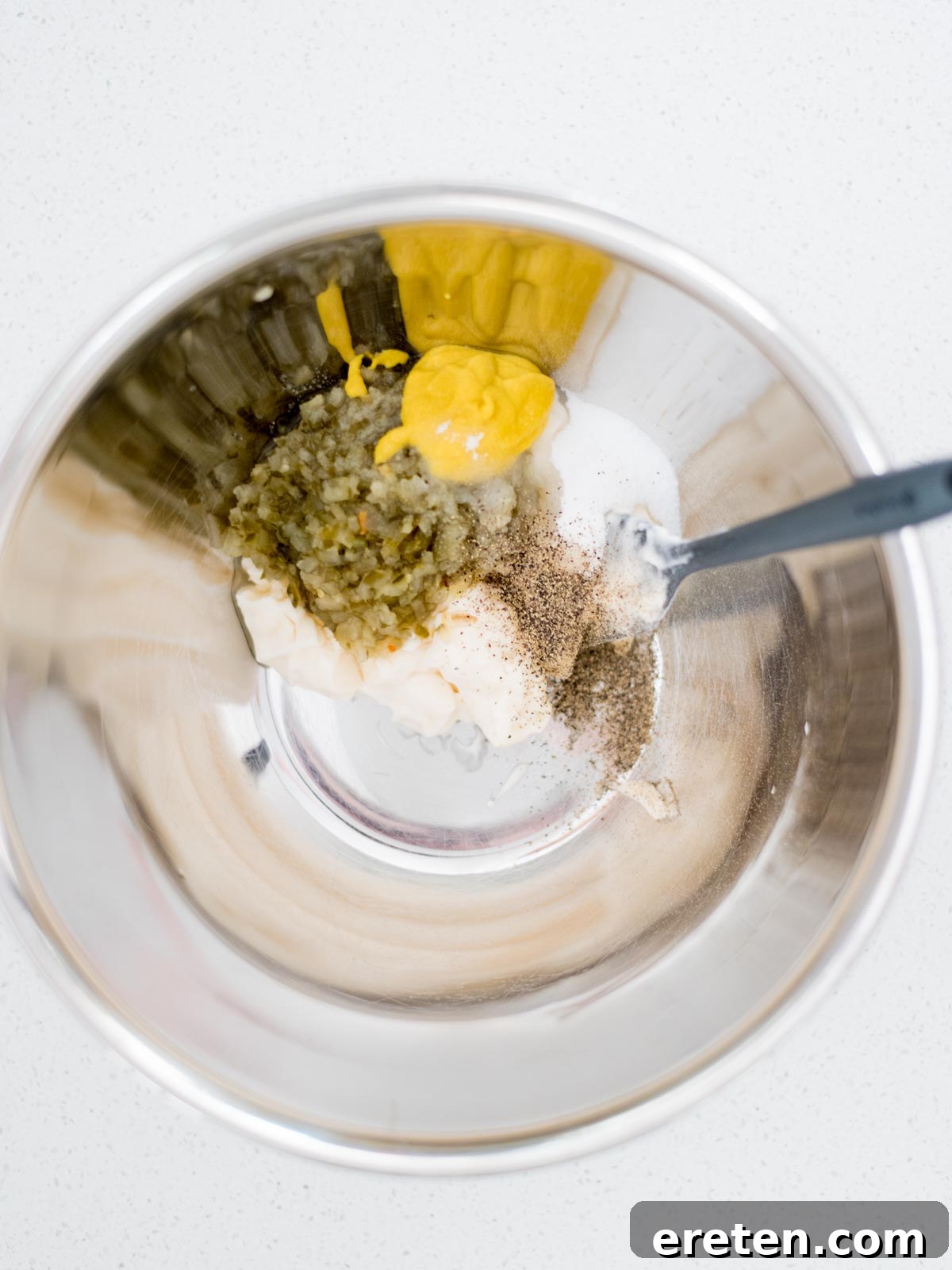 potato salad dressing ingredients in a mixing bowl