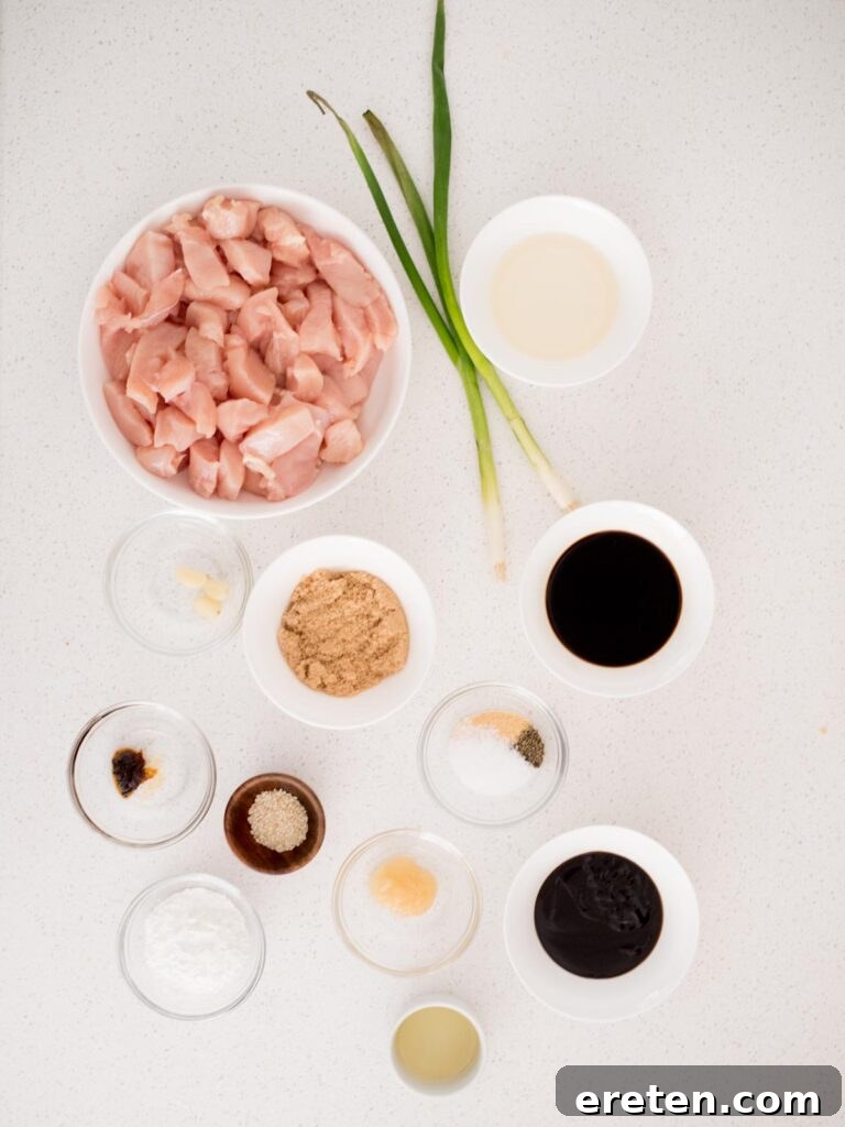 All the fresh ingredients meticulously laid out, showcasing what's needed to prepare a mouth-watering General Tso Chicken dish.