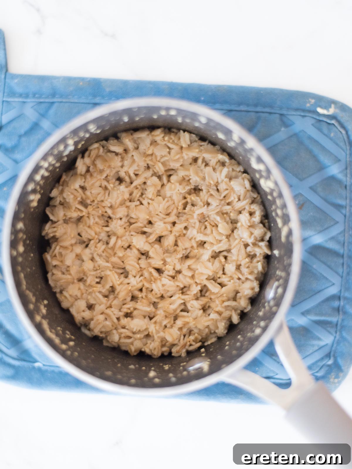 Cozy Banana Bread Oatmeal 5 cooked oats in a saucepan