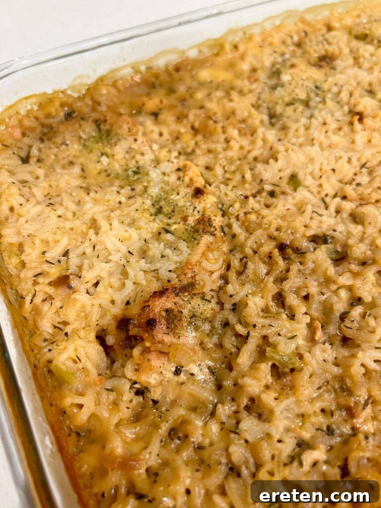 Creamy No-Peek Chicken and Rice Casserole baked to golden perfection in a baking dish