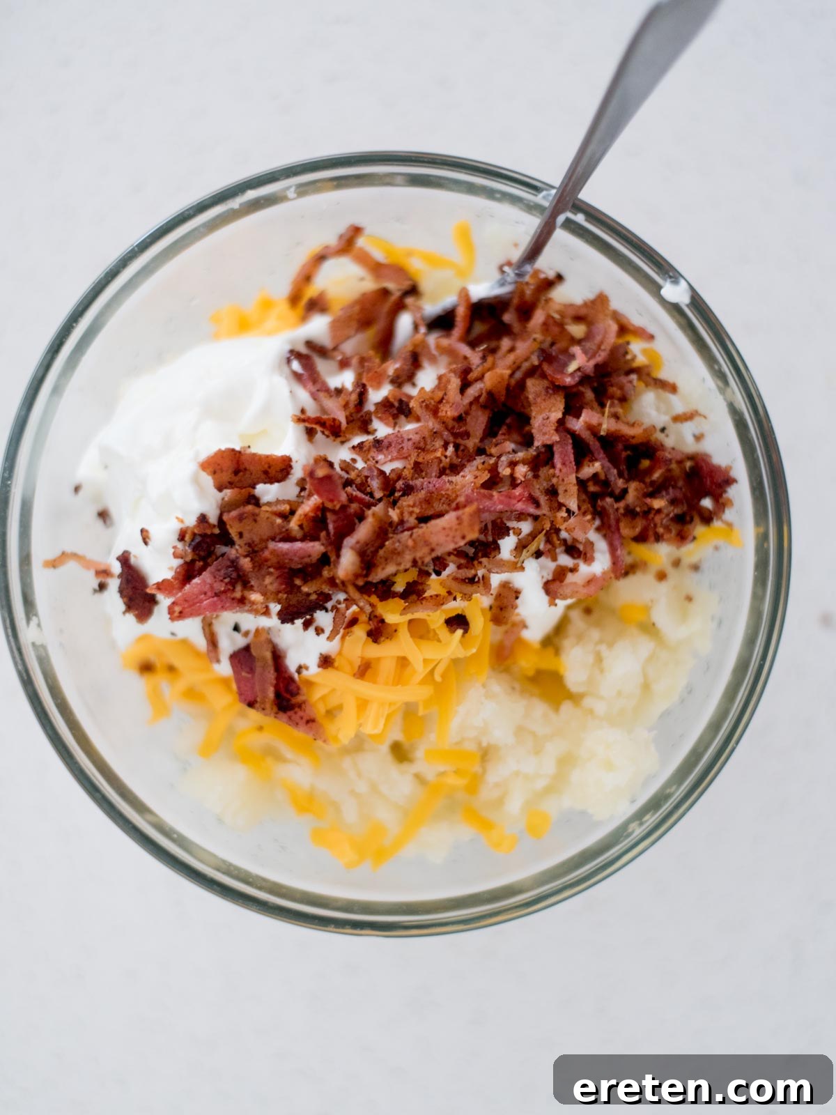 Ingredients added to a mixing bowl to make the potato filling.
