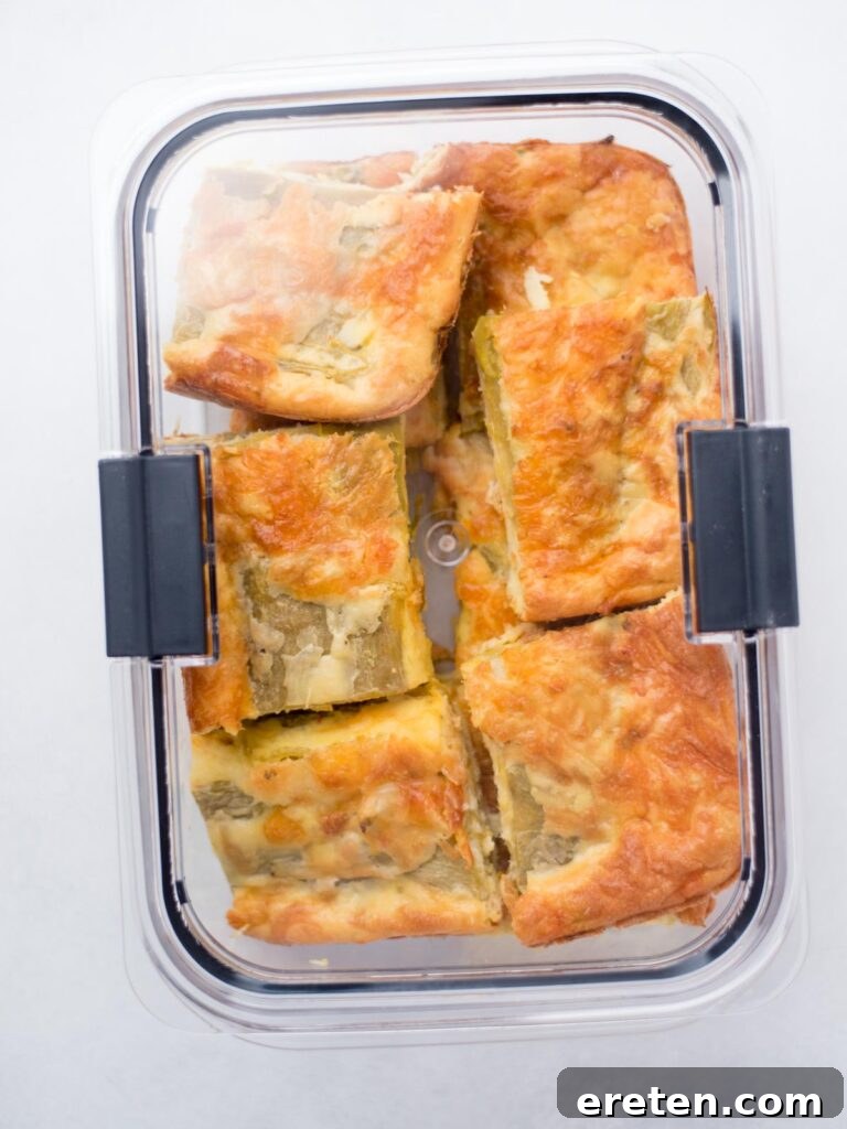 Leftover hatch chile relleno slices neatly stored in an airtight container, ready for future enjoyment.