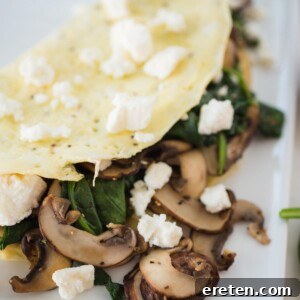 Spinach Mushroom and Feta Omelet on a white plate