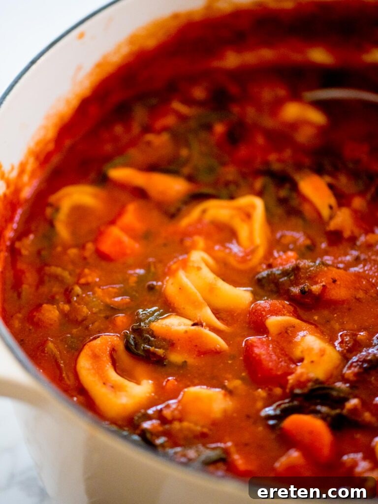 spinach tortellini soup in a dutch oven