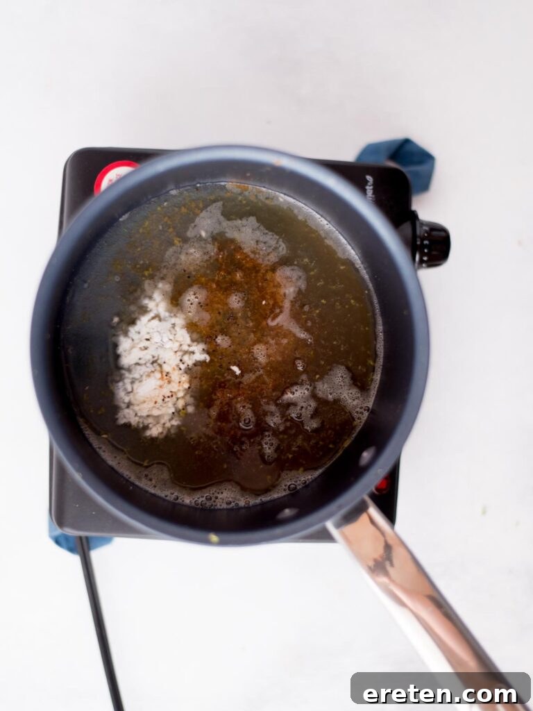 Tequila lime sauce ingredients measured and added to a saucepan, ready to cook.