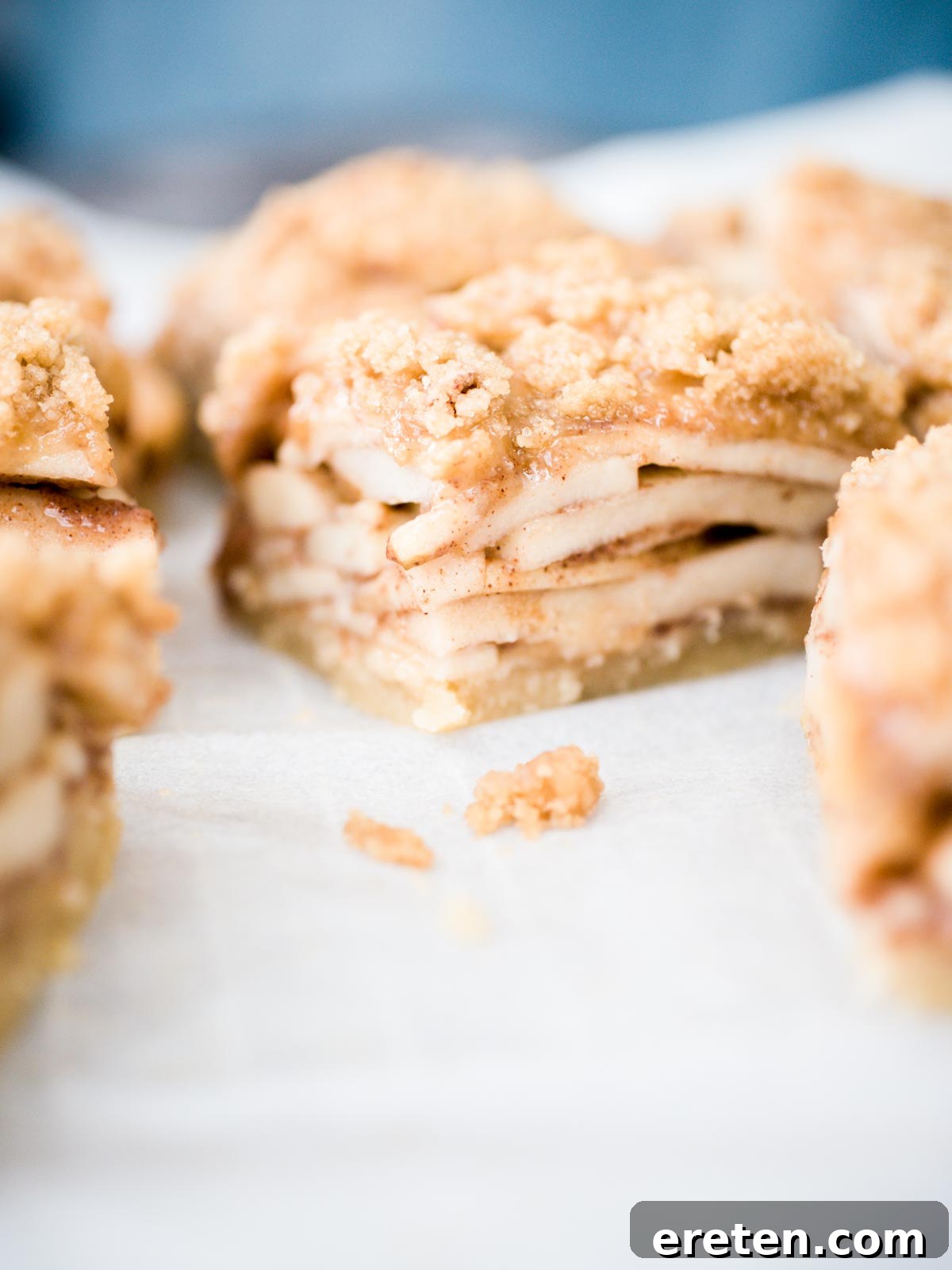 loaded apple pie squares on parchment