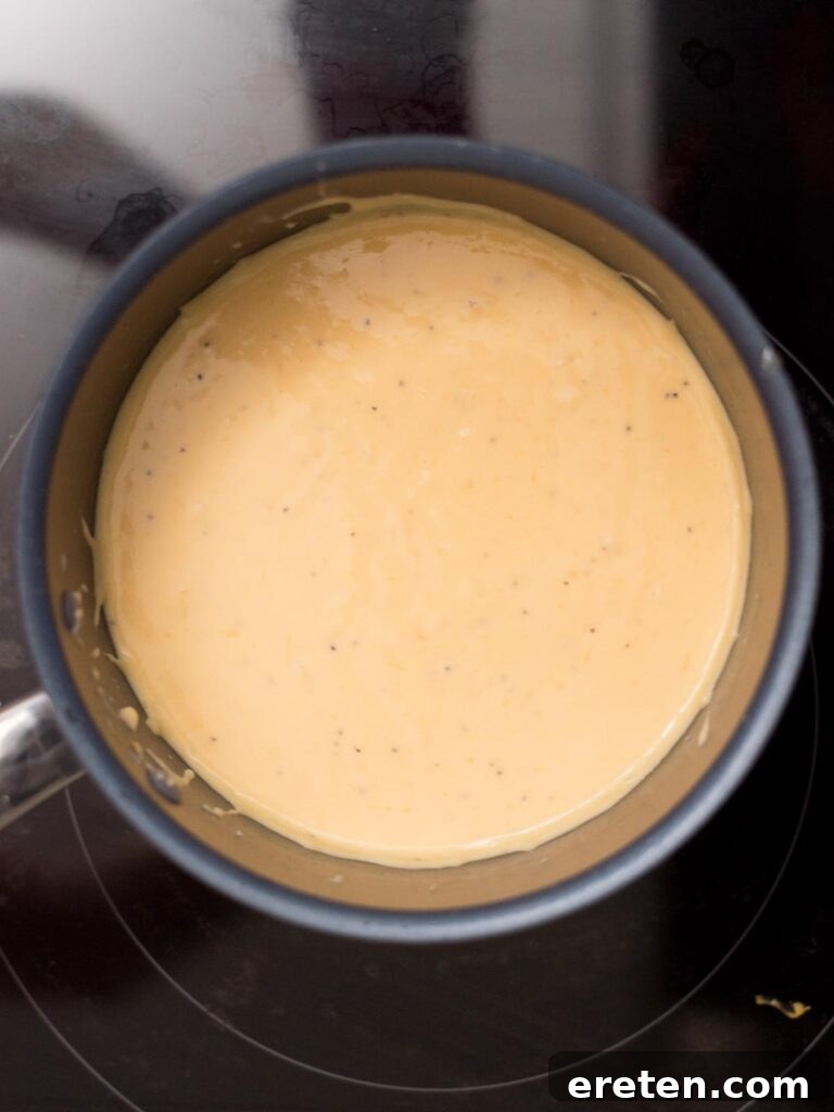 Cheese sauce in a saucepan.