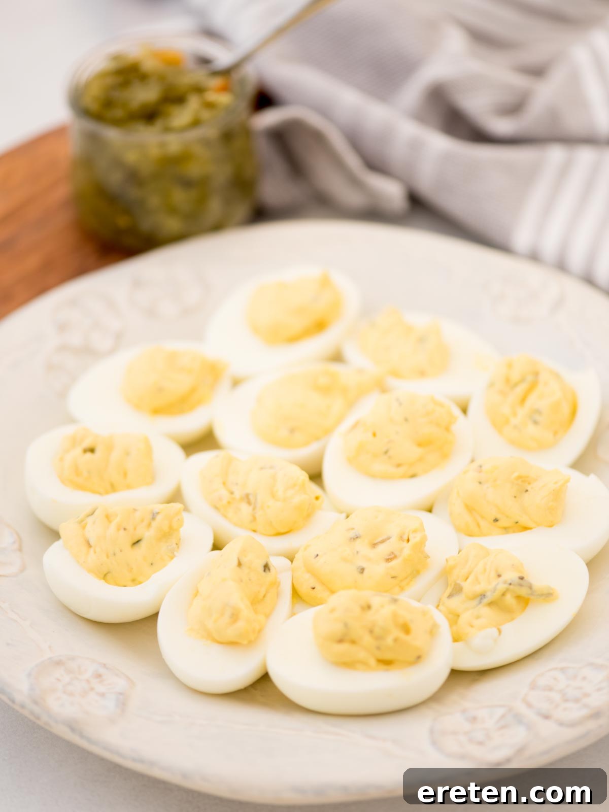A beautifully arranged platter of Southern Deviled Eggs, garnished with paprika.