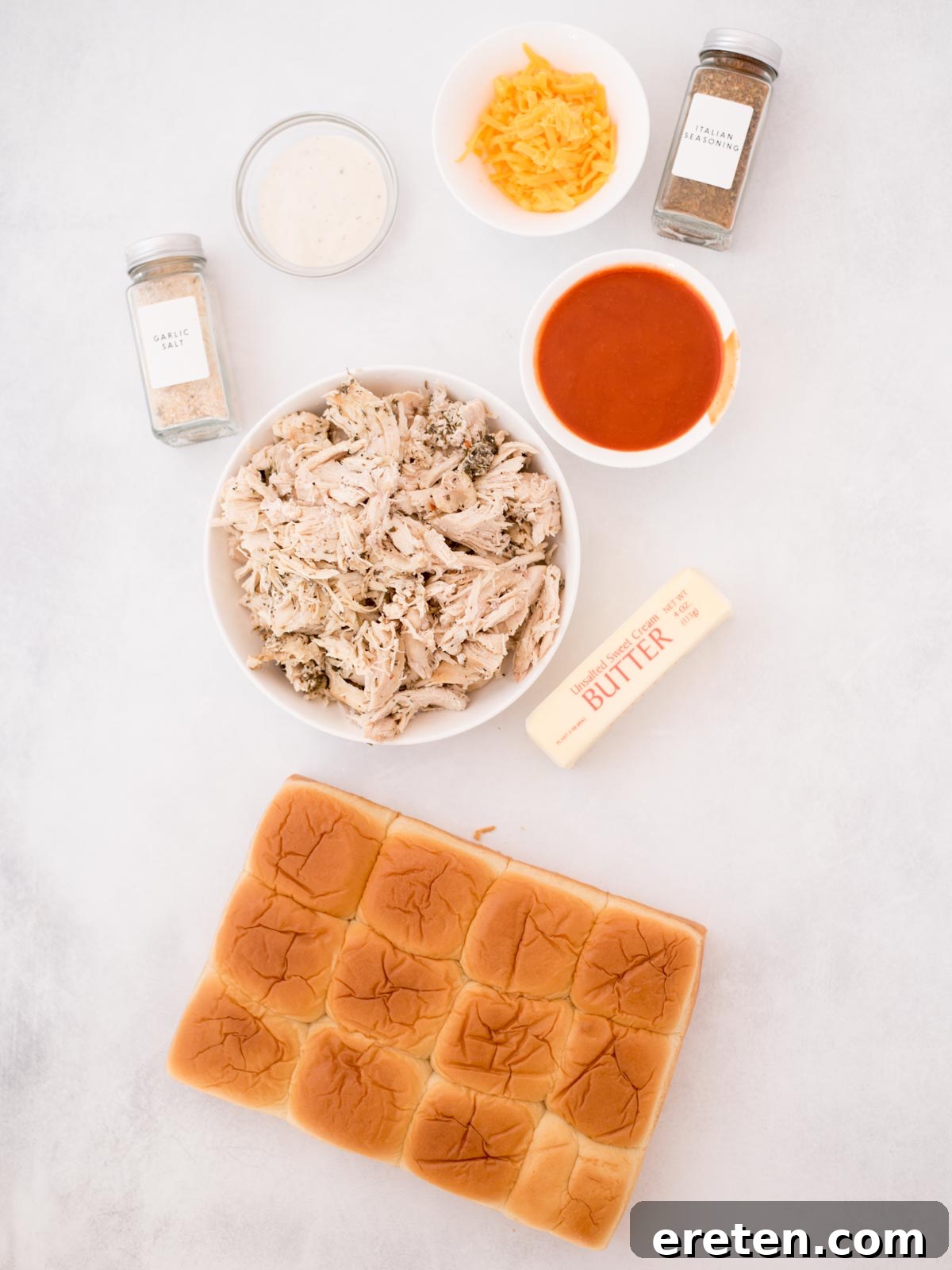 Ingredients shown are used to prepare buffalo chicken sliders.